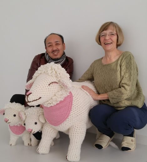 Gayle Roehm with the President of Pierrot Yarns, celebrating the Year of the Sheep